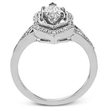 This intricate and unique ring setting is made for a marquise shaped center stone and features .23 ctw of white accent diamonds in 18k white and rose gold.