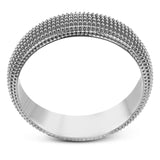 This 14k gold band features a granulated surface that is hand-created by experienced artisans.