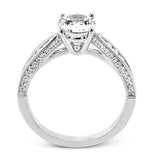 Delightful details abound in this 18k white gold engagement ring, set with .33 ctw of side diamonds.