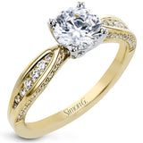 Delightful details abound in this 18k white gold engagement ring, set with .33 ctw of side diamonds.