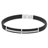 This bold bracelet features black rubber with 14k gold accents set with .35 ctw of white diamonds.