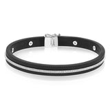 A sleek line of .39 ctw of diamonds makes a statement in this black rubber bracelet with 14k gold elements.