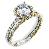 This ring is certainly a twist on a classic, with the band and halo formed from two tones of 18k gold twisted together, and the engagement ring set with .18 ctw of diamonds.