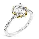 This ring is certainly a twist on a classic, with the band and halo formed from two tones of 18k gold twisted together, and the engagement ring set with .18 ctw of diamonds.