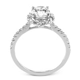 This ring is certainly a twist on a classic, with the band and halo formed from two tones of 18k gold twisted together, and the engagement ring set with .18 ctw of diamonds.