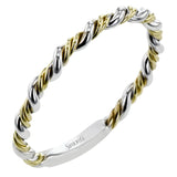 Two tones of 18k gold twist around each other in this contemporary yet timeless engagement ring.