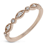 This ring is perfect for stacking with a distinctive design set with  .20 ctw of diamonds.