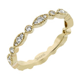 This ring is perfect for stacking with a distinctive design set with  .20 ctw of diamonds.