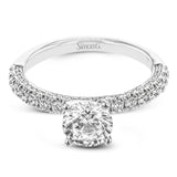This engagement ring is sure to shine, with a classic straight design set with .49 ctw of white side diamonds.