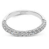 This engagement ring is sure to shine, with a classic straight design set with .49 ctw of white side diamonds.