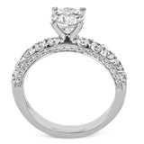 This engagement ring is sure to shine, with a classic straight design set with .75 ctw of white side diamonds.