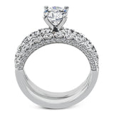 This engagement ring is sure to shine, with a classic straight design set with .75 ctw of white side diamonds.
