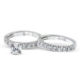 This engagement ring is sure to shine, with a classic straight design set with .75 ctw of white side diamonds.