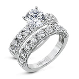 This engagement ring makes a statement with 1.39 ctw of side diamonds that shine from the top ad sides of the ring.