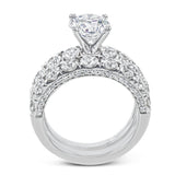 This engagement ring makes a statement with 1.39 ctw of side diamonds that shine from the top ad sides of the ring.