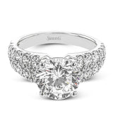 This bold engagement ring contains 1.50 ctw of side diamonds and will be sure to draw anyone's eyes with its modern design.