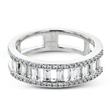 Baguette diamonds stand to attention and create and architectural effect in this unique 18k white gold ring design.