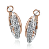 These bold earrings create a statement by combining 18k yellow and white gold, accented by .46 ctw of white diamonds.