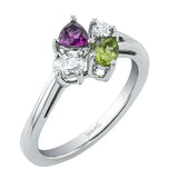 Our modern update on the three stone ring, this piece features a round, pear, and oval diamond brought together in a stunning design.
