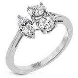 This ring design transforms the concept of three-stone, with two oval diamonds and a larger marquise shaped diamond set in a geometric shape.