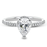 A hidden underhalo of brilliant diamonds reveals itself when this ring is turned to side, diamonds shining from every angle.