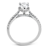A hidden underhalo of brilliant diamonds reveals itself when this ring is turned to side, diamonds shining from every angle.