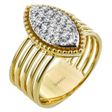 This 18k gold ring certainly makes a statement with .49 ctw of white diamonds pave set into a marquise shape placed onto five bands of yellow gold, creating a stacked look.