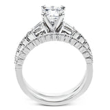 This wedding set stands apart with a unique design featuring two tapered baguette side stones on either side of the center stone, along with .43 ctw of round white accent diamonds.