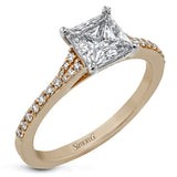 Simple yet stunning, this graceful engagement ring is made for a princess cut center stone and is set with .16 ctw of white diamonds.