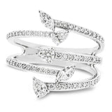 This geometric ring showcases .43 ctw of round diamonds, .08 ctw marquise accents, and one .07 ct of pear shaped diamond.