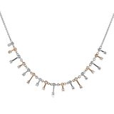 This delicate two-tone necklace of 18K white and rose gold, sparkles in an icicle motif with 0.65 ctw of diamonds.