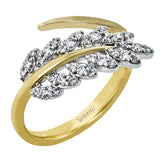 A sparkling leaf is crafted from two tones of gold in this remarkable ring that is set with .30 ctw of white diamonds.