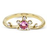 This 18k yellow gold ring provides the ideal sparkle with a .28 ct spinel and .09 ctw of white diamonds.