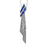 Dress up any outfit with this asymmetric diamond pendant which features straight baguettes 0.79 ctw and round brilliant diamonds 0.82 ctw