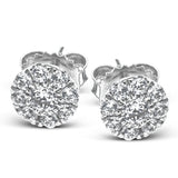 Set in 18K white gold and featuring .60cttw diamonds, these stud earrings are a staple in any jewelry wardrobe.