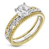 This beautiful two-tone 18k gold wedding set features an organic design white gold inner ring, with a yellow gold jacket surrounding it that is set with .22 ctw of yellow diamonds.