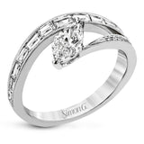 Baguette diamonds and milgrain details in white gold enhance the marquise center stone set at an angle in this dynamic Lightning Collection ring.
