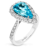 The cool blue ocean waves are embodied in this timeless 18K white gold ring featuring a 3.44ct pear shaped paraiba tourmaline center stone and 1.09cttw white diamonds.