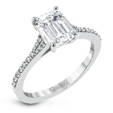 Simple yet stunning, this graceful engagement ring is made for an emerald cut center stone and is set with .16 ctw of white diamonds.