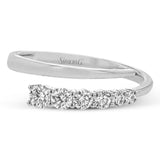 This dynamic 18k gold ring adds the perfect accent to any outfit with .38 ctw of diamonds in a graduated line.