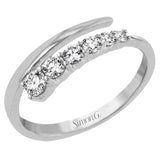 This dynamic 18k gold ring adds the perfect accent to any outfit with .38 ctw of diamonds in a graduated line.