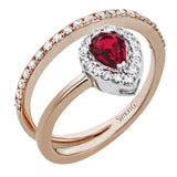 This lovely 18k rose gold ring contains .47 ct pear shaped ruby surrounded by .33 ctw of white diamonds.
