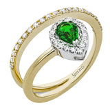 This 18k yellow gold spiral ring contains a beautiful .41 ct pear shaped emerald that is accented by .33 ctw of white diamonds.