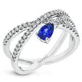 18K white gold criss-cross right hand ring features a pear-shaped Sapphire 0.53 ctw., and rows of RD brilliant diamonds 0.36 ctw.