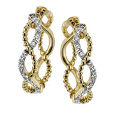 A twisting design of 18k yellow and white gold are an ideal size of everyday wear, while .17 ctw of diamonds add the perfect touch of sparkle.