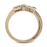 This 18k rose gold spiral ring is sprinkled with colorful gemstones embodying the spirit of springtime, including round white diamonds, a green tsavorite garnet, a pink sapphire and a spinel.