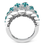 The contemporary design of this white gold ring is elevated by 1.10 ctw of white diamonds and .65 Paraiba tourmaline stones in an elegant pave setting.