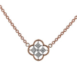 This charming necklace features a delicate design of two-tone gold set with .04 ctw of white diamonds.