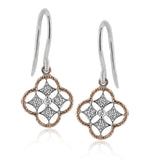 These earrings are perfect for everyday wear with a two-tone gold patterns set with .08 ctw of sparkling white diamonds.