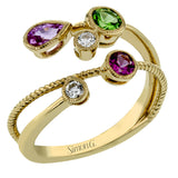 This contemporary crossover ring crafted in 18k yellow gold features .13 ctw of white diamonds, .30 ctw of green tsavorite, .28 ctw of pink sapphire and .20 ct of pink spinel.